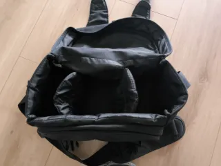 Bolsa cámara fotos reflex negra y rosa