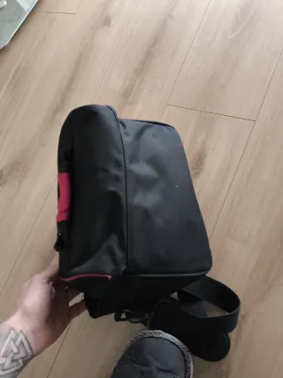 Bolsa cámara fotos reflex negra y rosa