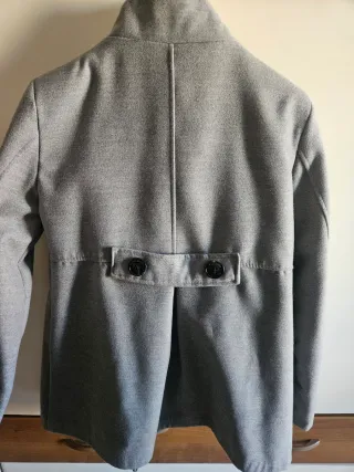 Cappottino grigio nuovo.