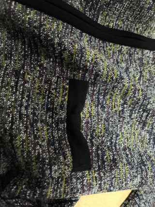 Rebeca mujer gris y multicolor