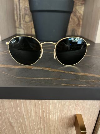 Gafas de sol Ray-Ban redondas doradas