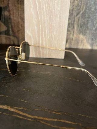 Gafas de sol Ray-Ban redondas doradas