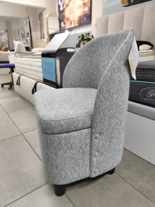 Sillón baúl tapizado gris