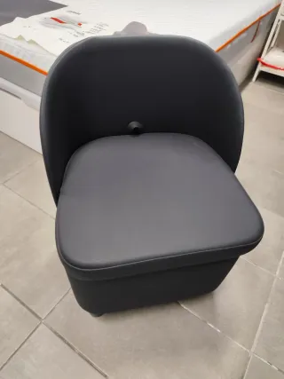 Sillón baúl tapizado gris