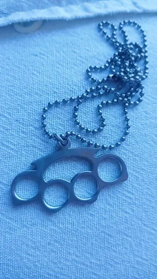 Collar de Puño Americano.