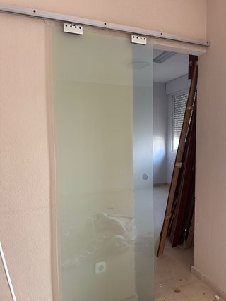 Puerta corredera de cristal