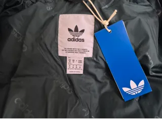 Chaqueta plumífero Adidas verde para mujer