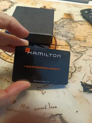 Tarjeta de garantía Hamilton y libro instrucciones
