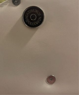 Borsetta Diesel bianca/panna,in pelle.