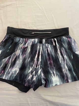 Shorts Oysho running morado y negro
