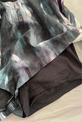 Shorts Oysho running morado y negro