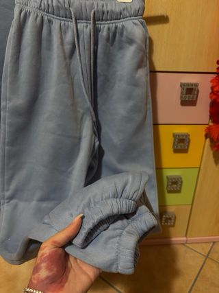 Tuta sportiva celeste con body abbinato