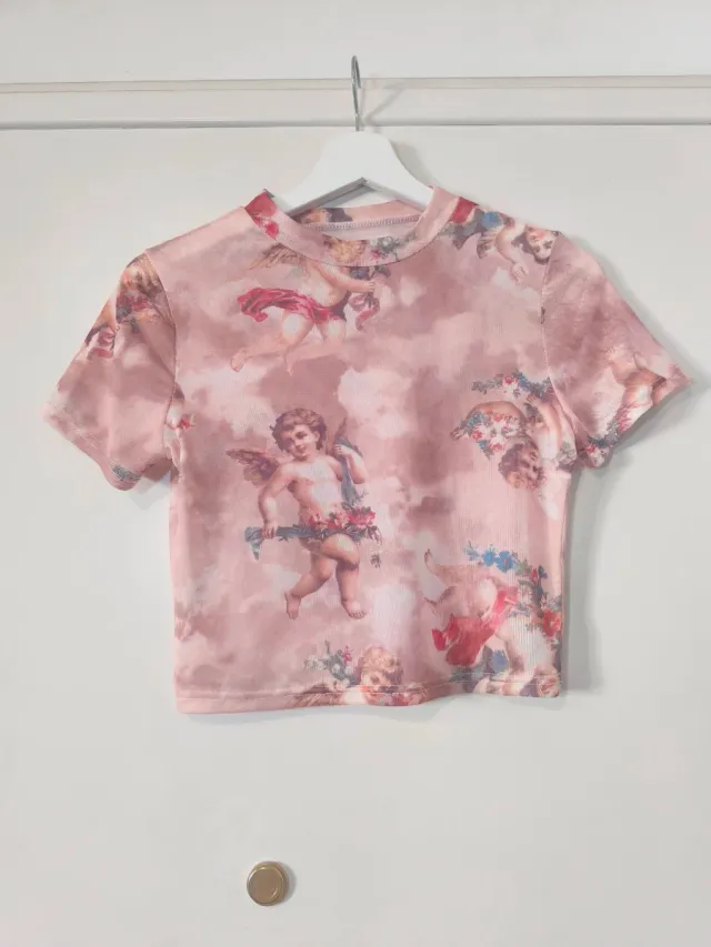 Crop top estampado ángeles rosa