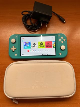 Nintendo Switch Lite + Caricabatterie e Custodia
