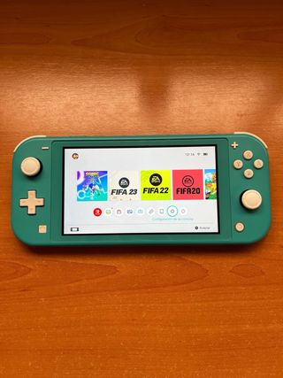 Nintendo Switch Lite + Caricabatterie e Custodia