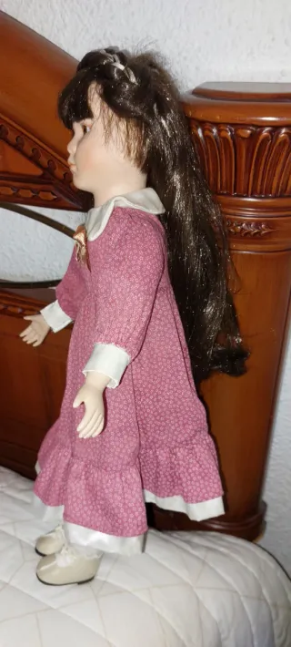 Bella bambola in porcellana antica