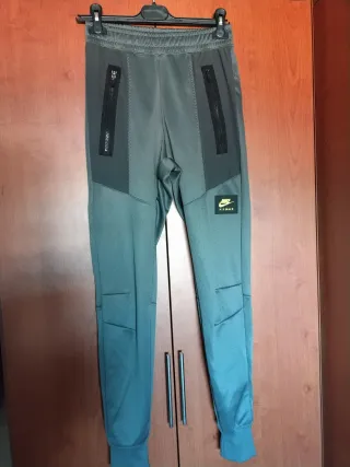 Pantalón chándal Nike hombre gris y verde