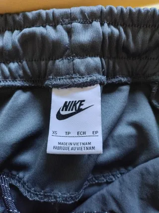 Pantalón chándal Nike hombre gris y verde