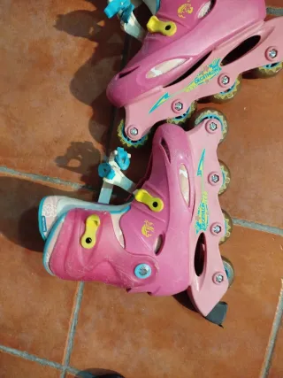 Patines en línea rosas.Decatlhon Talla 34 .