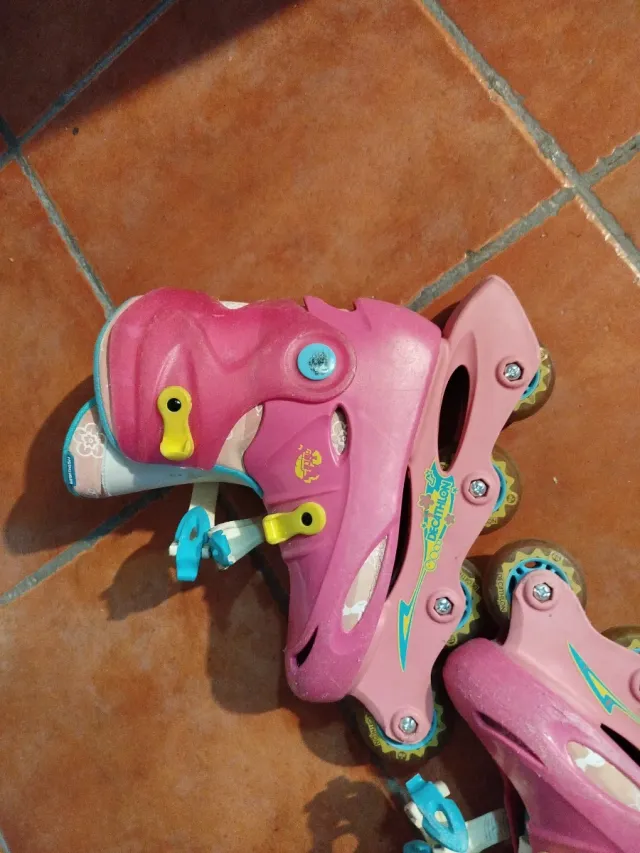 Patines en línea rosas.Decatlhon Talla 34 .