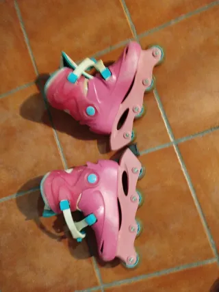 Patines en línea rosas.Decatlhon Talla 34 .