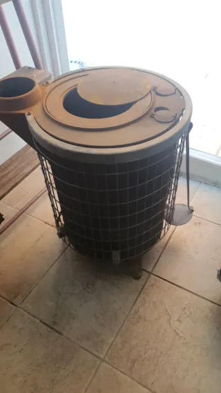 Estufa leña redonda hierro retro