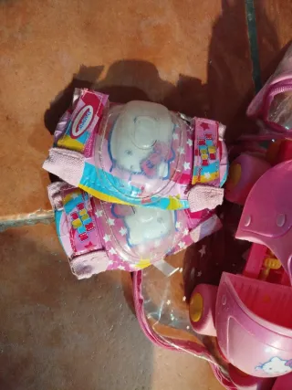 Patines conBolsa Hello Kitty transparente. T 28-30