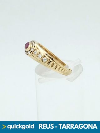 Anello in oro 18K con zirconi T15