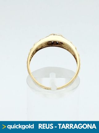 Anello in oro 18K con zirconi T15