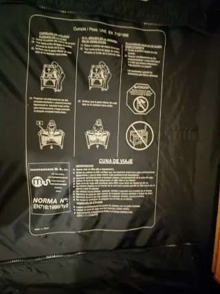 Cuna de viaje con estampado de vaca