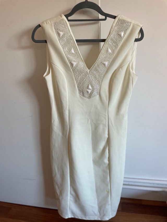 Abito bianco elegante con paillettes