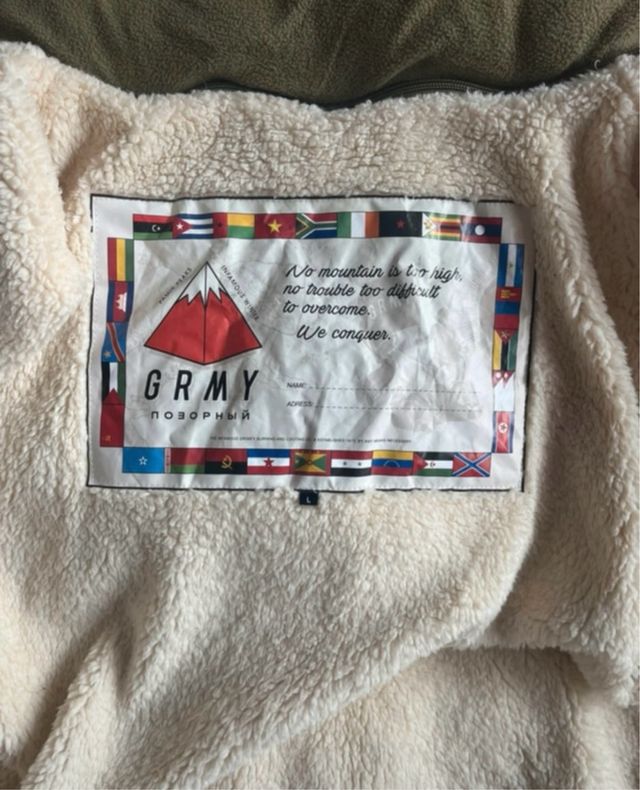 Abrigo con capucha y pelo