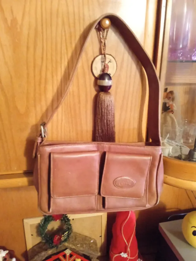 Bolso de piel marrón 3.50 cada uno