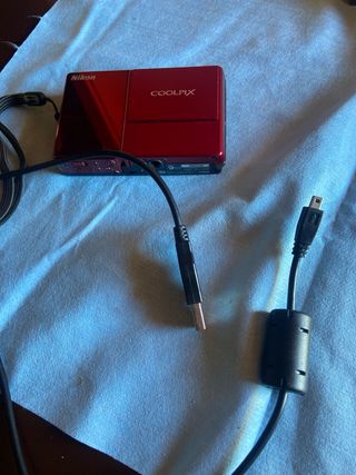 Fotocamera Nikon Coolpix Vintage con caricatore