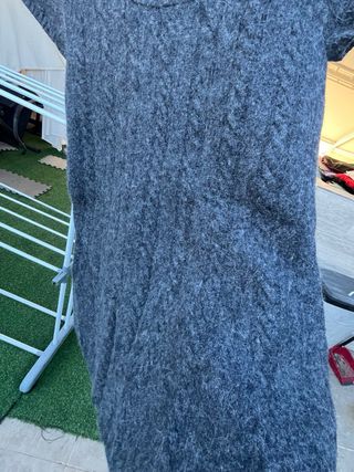 Jersey gris de punto con cuello alto