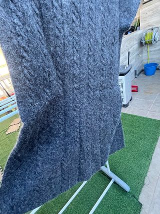 Jersey gris de punto con cuello alto