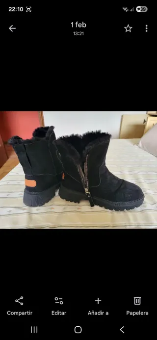 Botas de pelo negras con cremallera