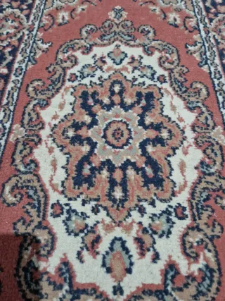 Alfombra persa pequeña