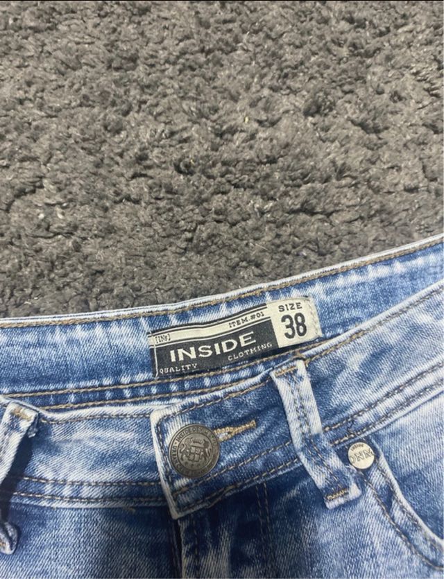 Vaqueros cortos desgastados azules