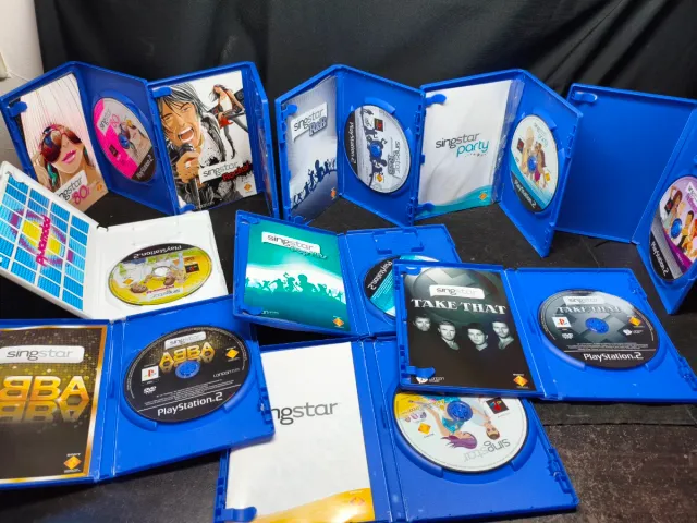 Lote 10 Jogos SingStar PS2 + Microfones