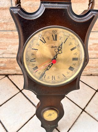 Orologio da parete in legno