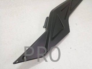 Chapa Bajo asiento Dch. Wottan Storm 125