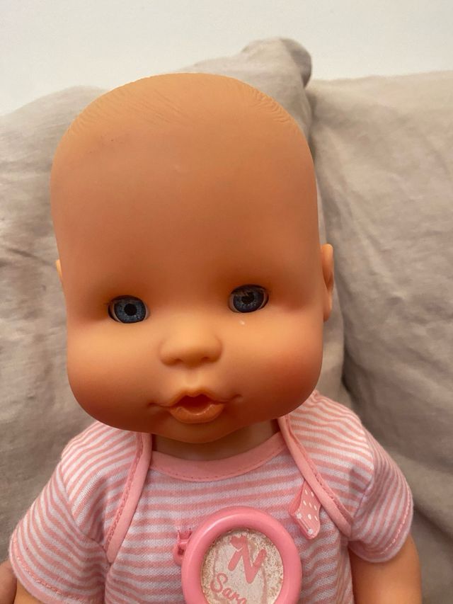 Muñeca bebé con accesorios