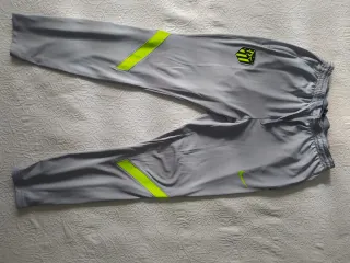 Pantalón Chándal AT. Madrid Nike Gris Verde