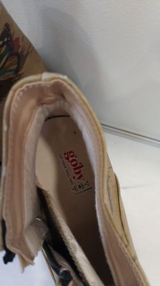 Cartera Victorio & Lucchino rosa tejida