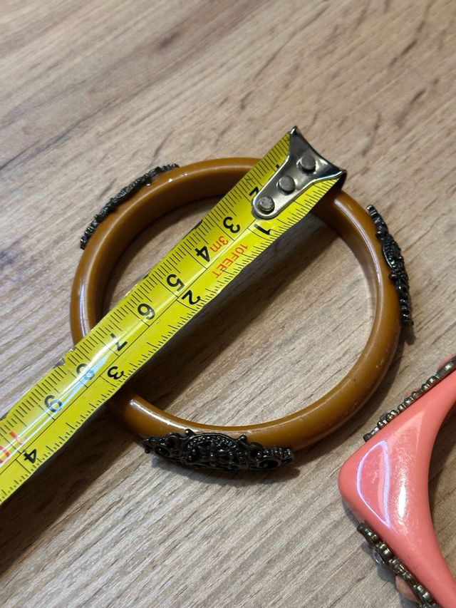 Set 2 bracciali rigidi decorati