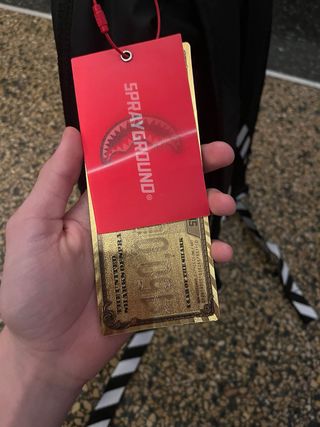 Zaino Sprayground nero con squalo