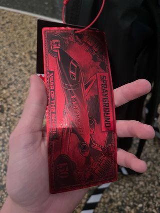 Zaino Sprayground nero con squalo