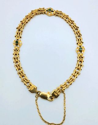 BRACCIALE CON PIETRE VERTI IN ORO 18K