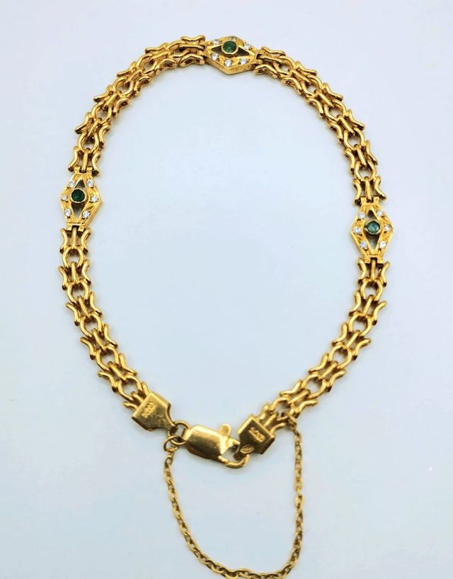 BRACCIALE CON PIETRE VERTI IN ORO 18K